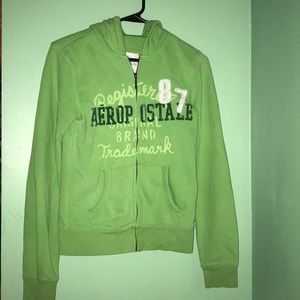 Green zip up jacket